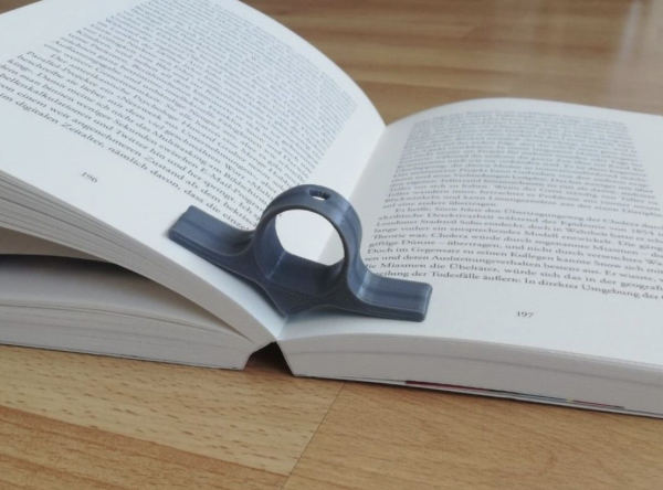 Book holder opening book as an example of 3D printing ideas