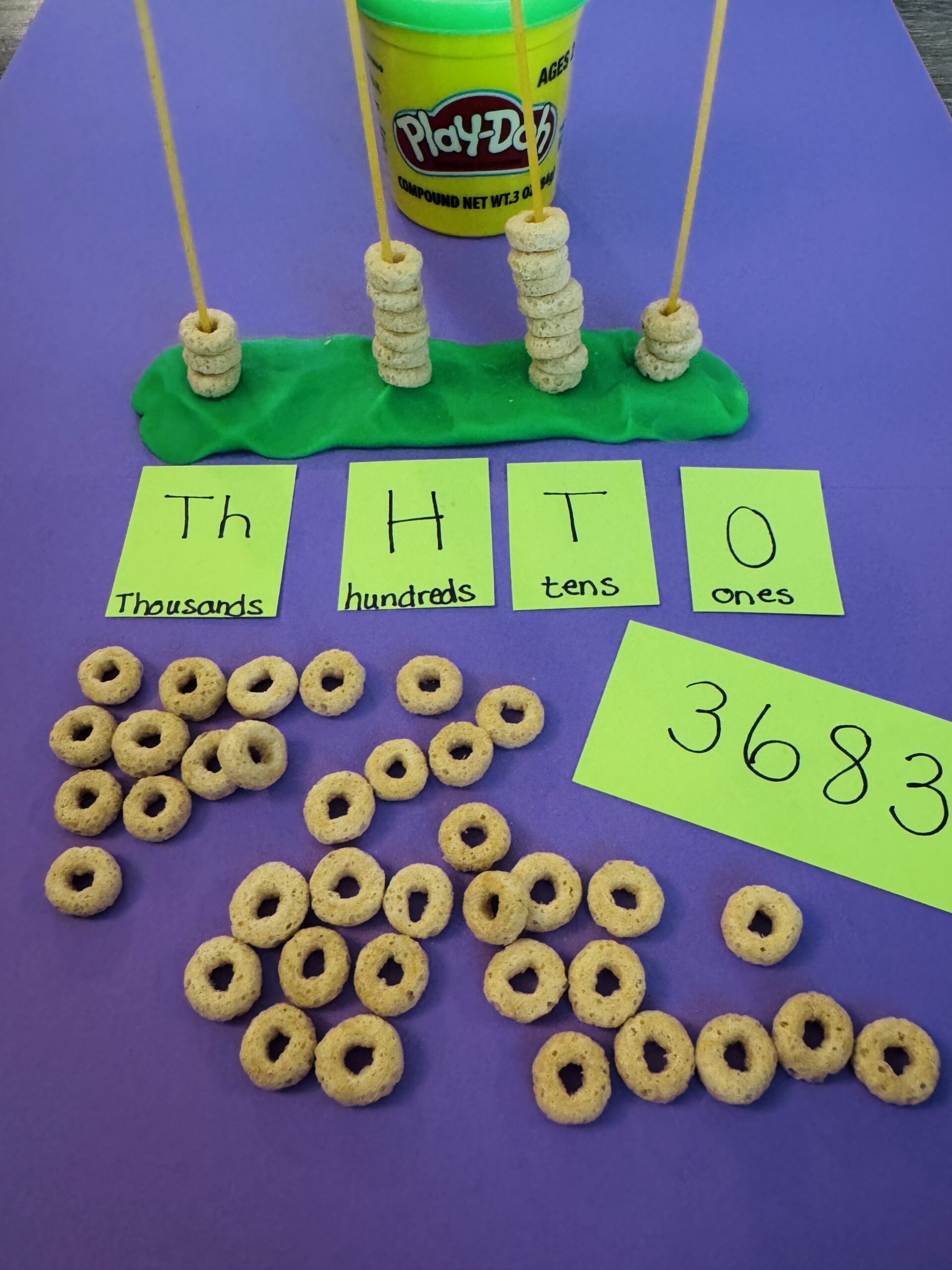 Cheerio Tower- place value activities