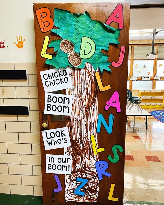 A door is designed to look like a book page from the book Chicka Chicka Boom Boom.