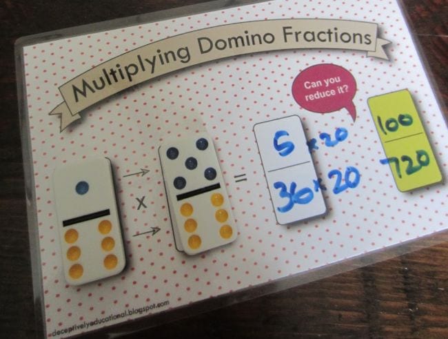 Multiplying Domino Fractions mat with three dominoes laid out to form an equation