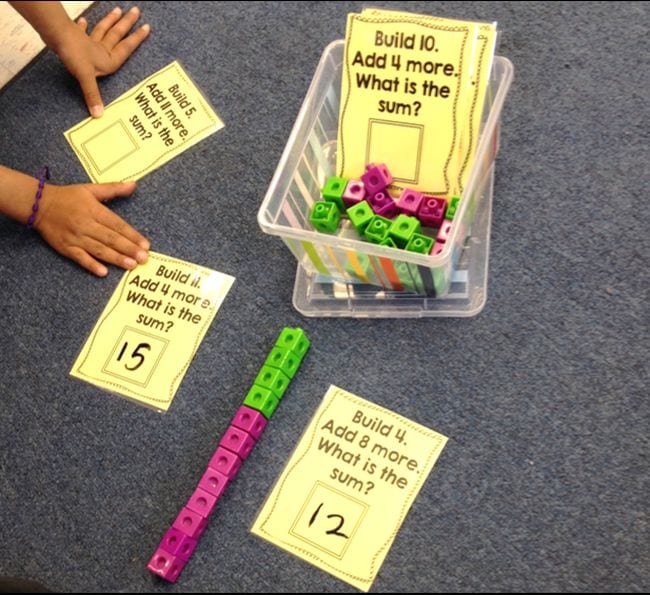 Math cubes with printed cards saying 
