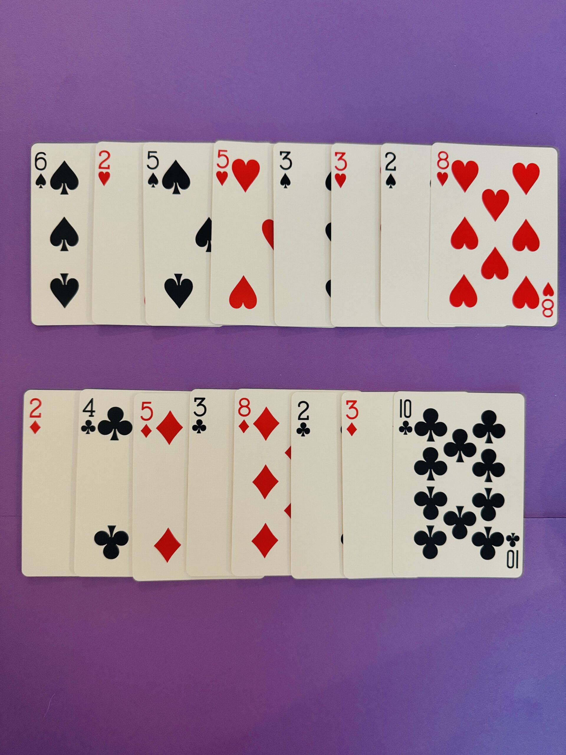 Set of cards set up to play Guess My Pattern