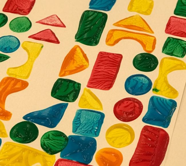 Different shapes in different primary colors are shown in this painting.