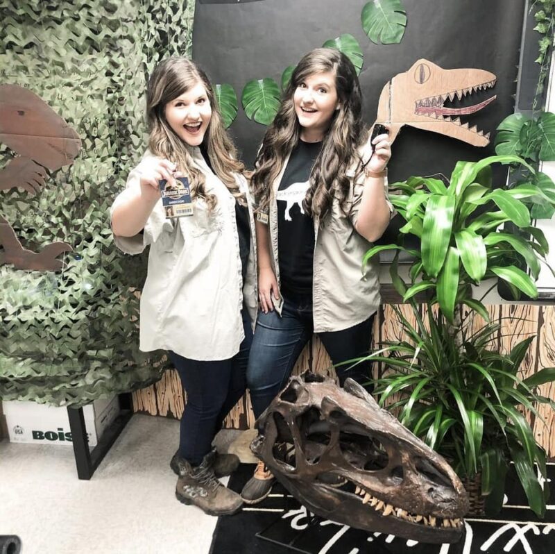 Co-teachers in a Jurassic World themed classroom.