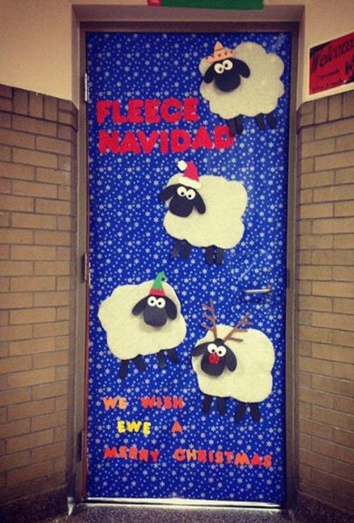 Classroom door decorated with large lambs and text reading Fleece Navidad: We Wish Ewe a Merry Christmas- holiday classroom doors
