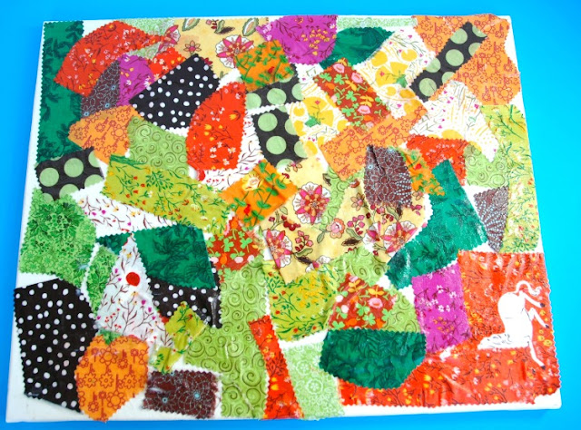 A collage of colorful fabric scraps made for a kindergarten art project