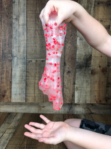 clear slime with red and white beads for circulatory system activity