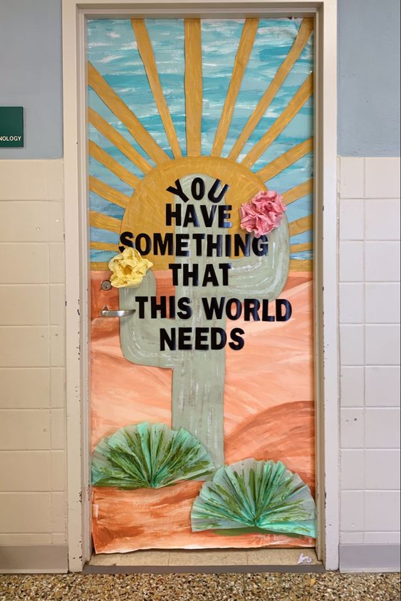 A door features a sun and cacti and says you have something that this world needs.
