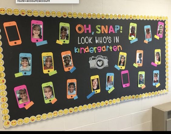 A bulletin board says Oh Snap! Look who's in kindergarten with pictures of the the students throughout.
