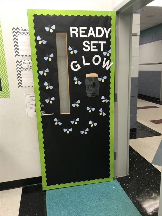 A door says ready set glow and features fireflies.