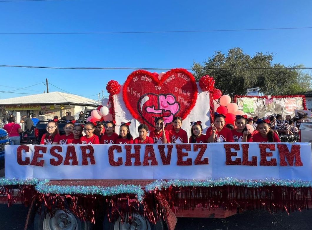 A parade float from Cesar Chavez Elementary has a Red Ribbon Week theme for a parade